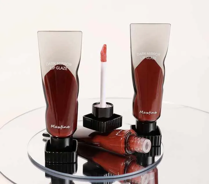 ترطيب الشفاه توهج زيت أحمر الشفاه السائل عالي اللمعان لون النفخ طلاء الشفاه عالي الصبغة Water Gloss Mirror Moisturizing Lip Glow Oil Liquid Lipstick High Shine Color Plumping High